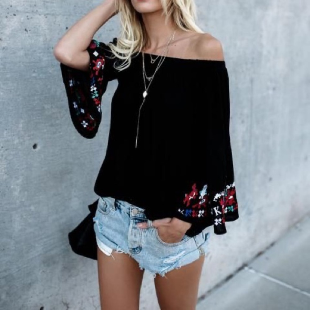 Embroidered bell sleeve top